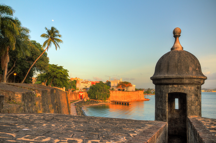 Beautiful summer afternoon at the outer wall with sentry box of fort San Felipe del Morro in old San Juan in Puerto Rico